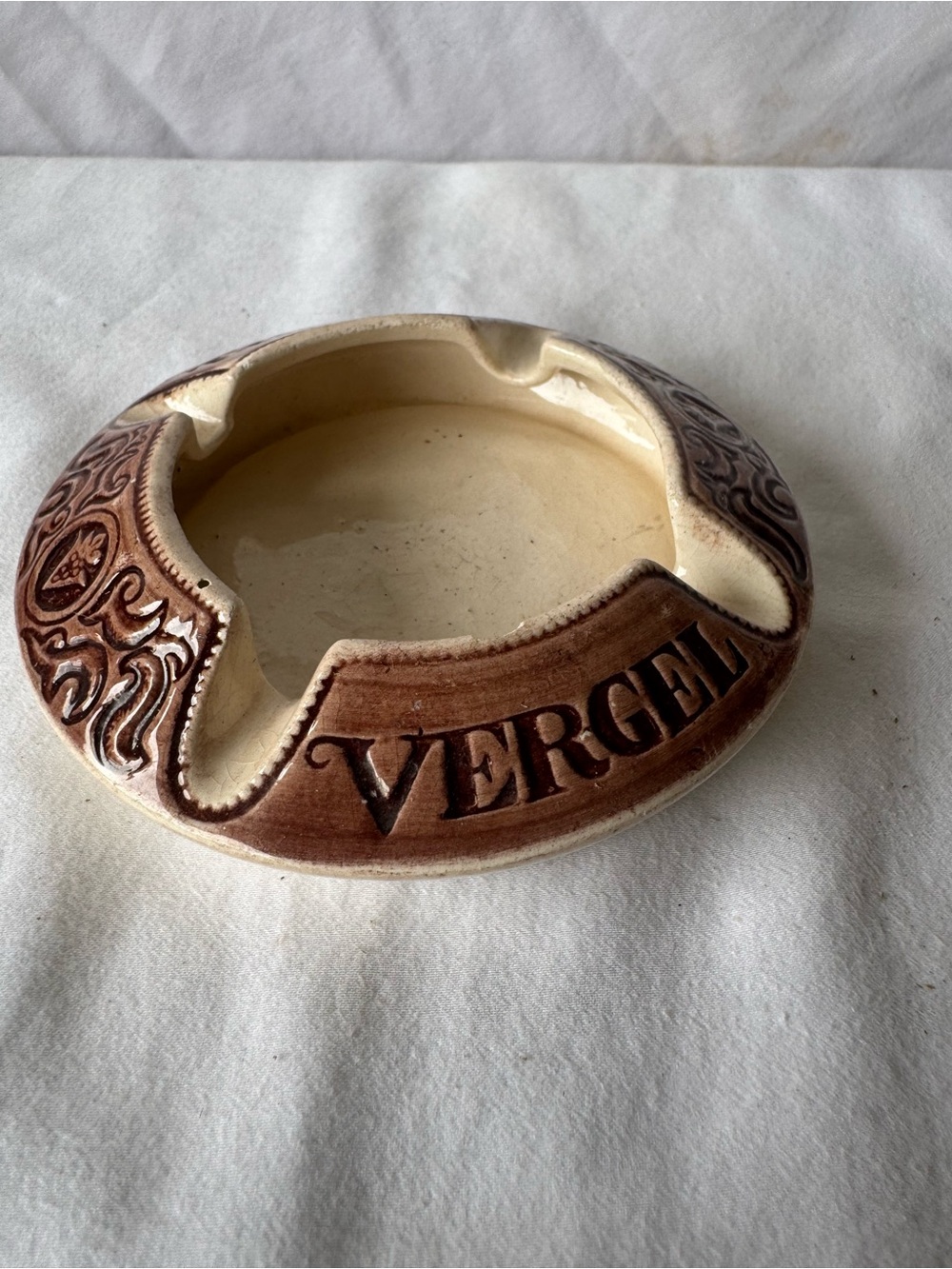 Ceramic base with maker's mark